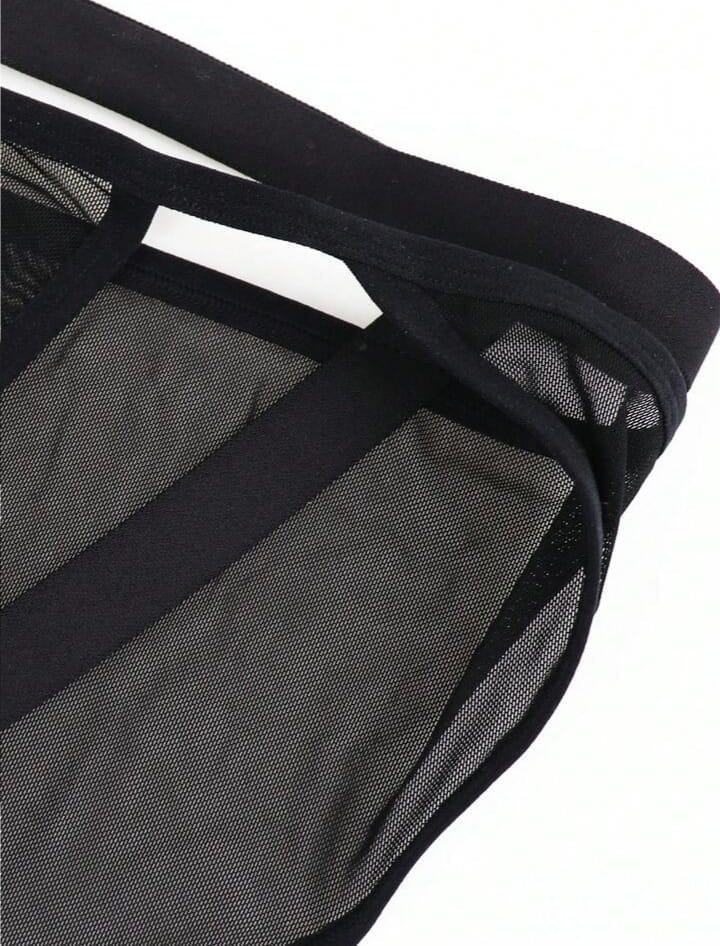 Sheer mesh cage brief in black